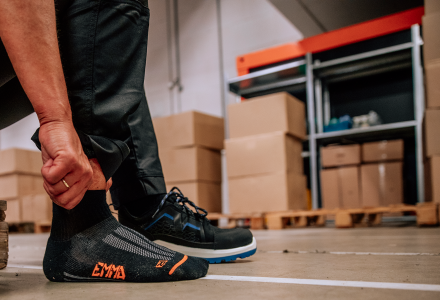 Wear good work socks that reduce moisture and friction